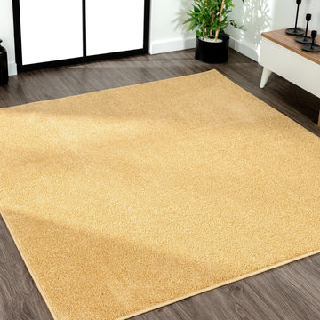 Haze Solid Low-pile Area Rug Mustard